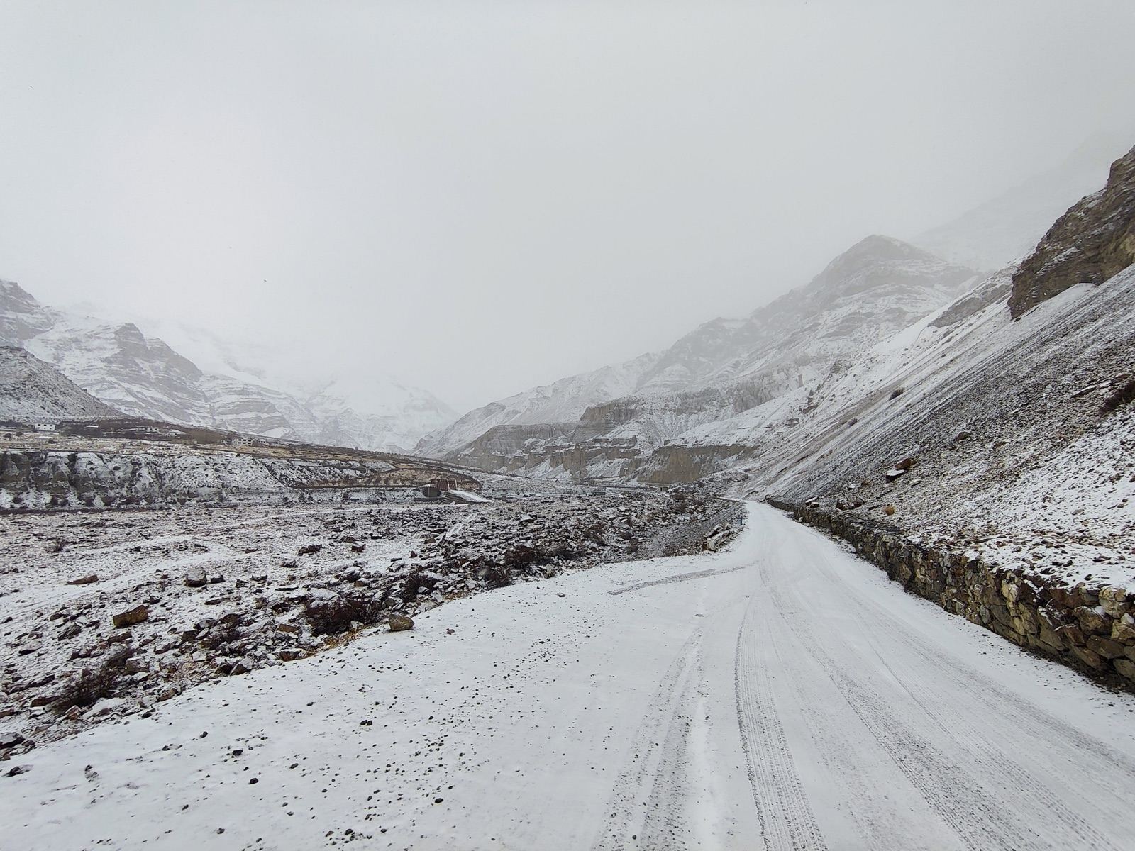 Support vehicles navigating heavy snow walls and ice crossings in Himachal