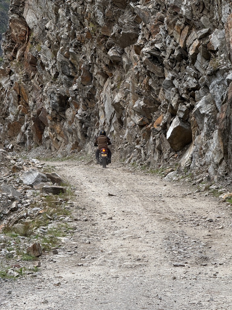 Sach Pass mountain road cliff